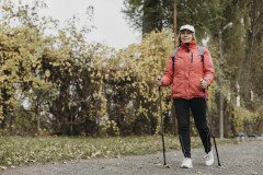 front-view-senior-woman-trekking-outdoors