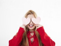 cheerful-woman-having-fun-with-hearts (1)